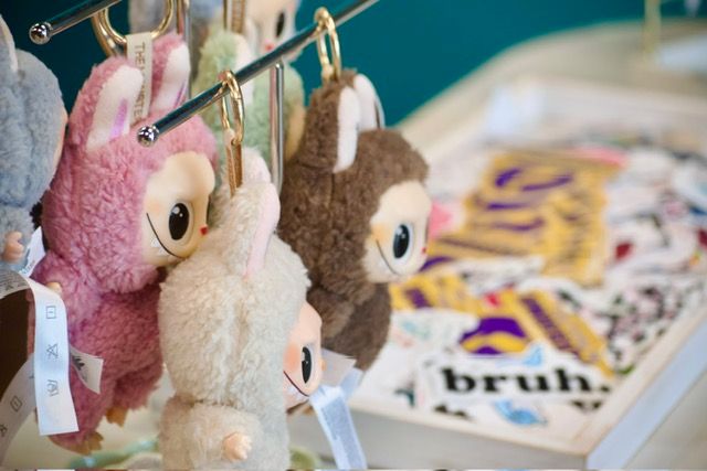 Colorful handmade items and studio details at Mudbug Art.